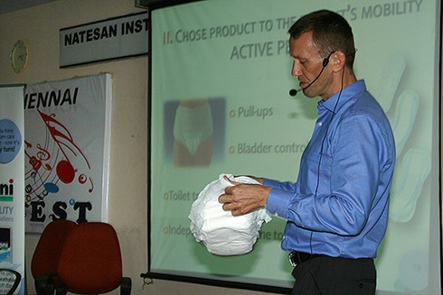 Mr. Jerzy Jusiega SENI, Poland demonstrates the use of incontinence support products.